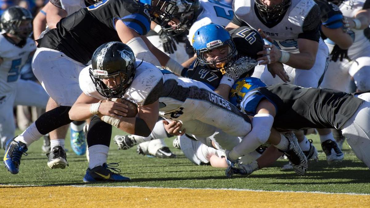 
Running back Wyatt Edmisten, who scored 32 touchdowns last year, will play a key role this season for defending state champion Shawnee Mission East.
