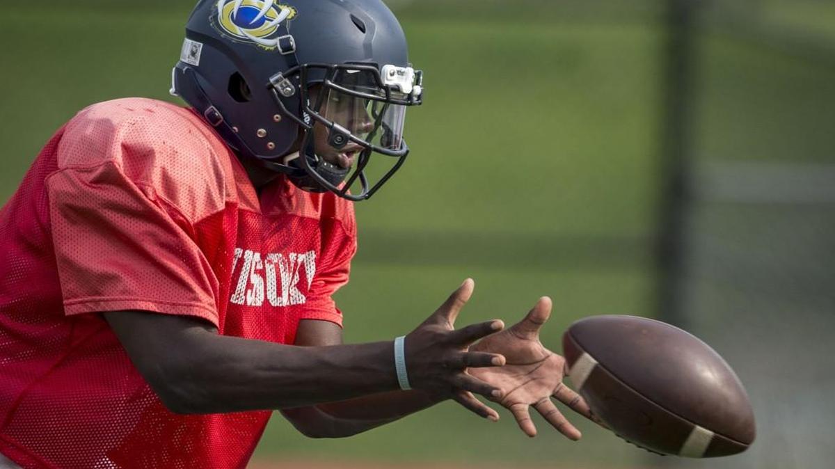 William Chrisman quarterback James Bailey.