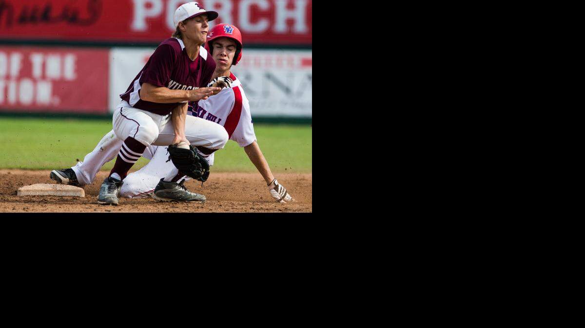 Pembroke Hill’s Brett Bethune (behind) slid safely into second base under the tag of Tyler Chritton of Logan-Rogersville on Friday in a Class 4 semifinal.<252><137>during the MSHSAA Class 4 semifinal game in O'Fallon, Missouri at TR Hughes Ballpark on Friday, June 6, 2014. Pembroke Hill defeated Logan-Rogersville 7-5 (Brian Davidson / Special to the Star)<252><137>