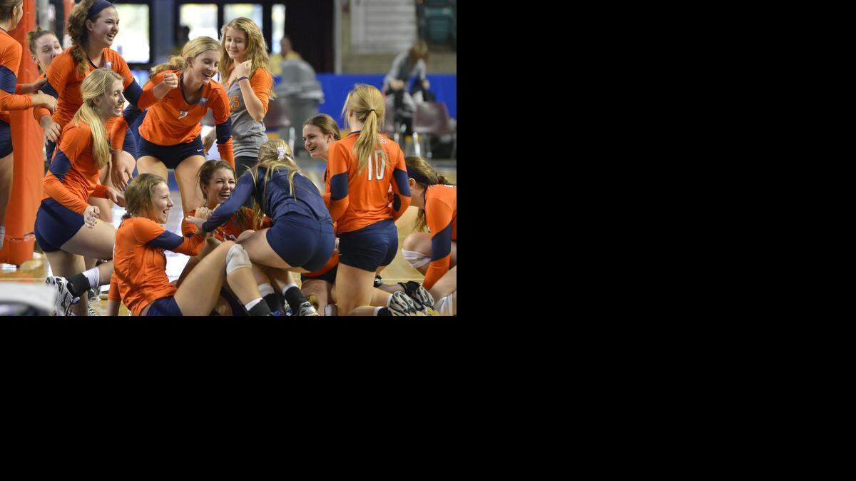
Olathe East, shown here celebrating a victory over Blue Valley Northwest in the Kansas Class 6A state championship match, will be among the teams in a stellar field on Saturday in the Time Warner Cable Volleyball Slam at St. James Academy. Matches begin at 8 a.m.
