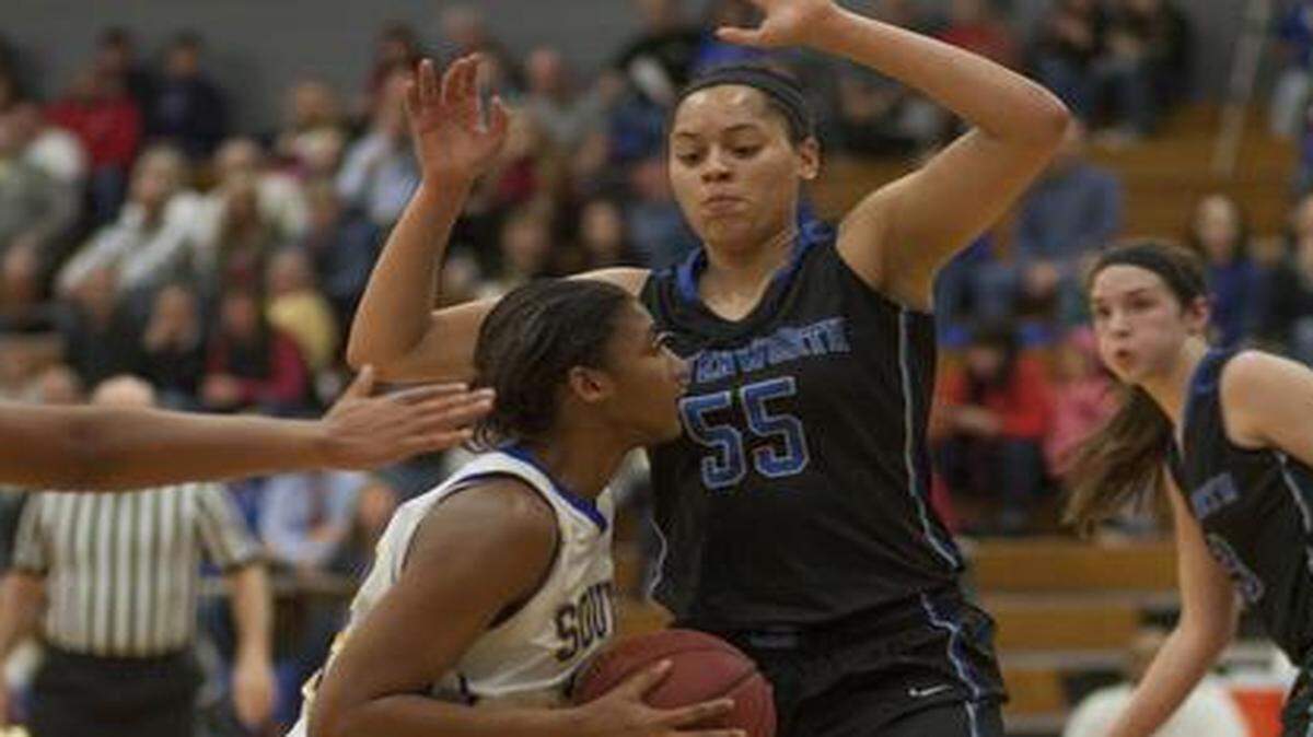 
Olathe South’s Dejanae Roebuck (with basketball) and Leavenworth’s Tyler Johnson are both members of the All-Sunflower League girls basketball first team, as recently anounced by the league.
