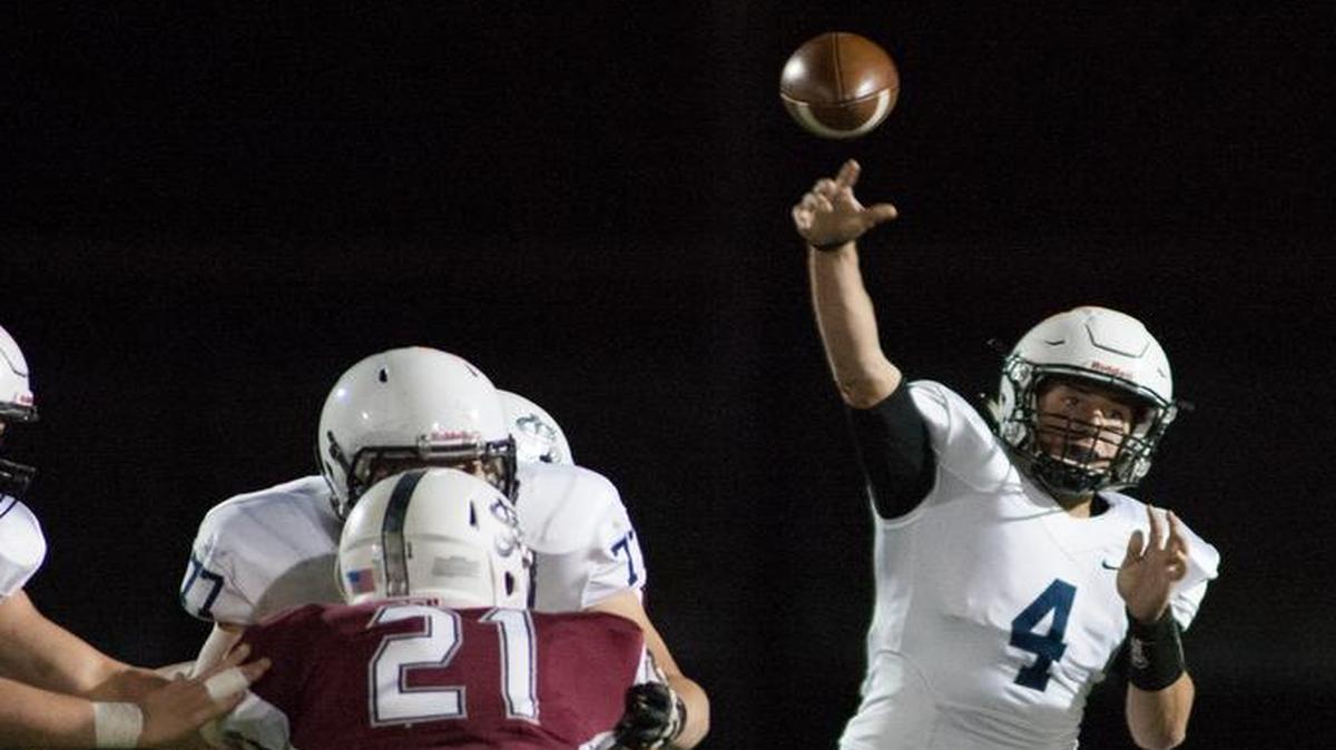 Mill Valley quarterback Logan Koch launched a pass against St. James Academy during their football game on Friday night.