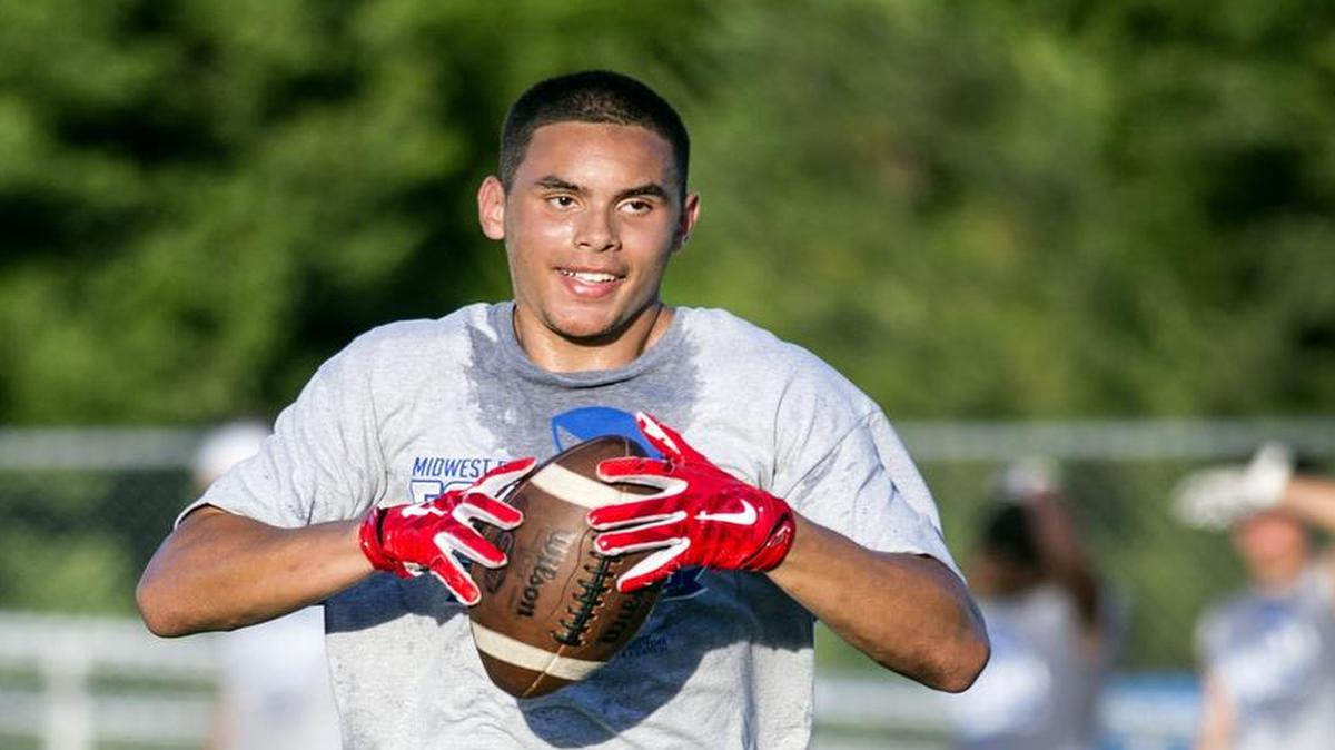Olathe North running back and safety Deion Poindexter took part in The Swarm Tour, a satellite camp put on by Michigan football coach Jim Harbaugh, in June at Blue Springs South High School.