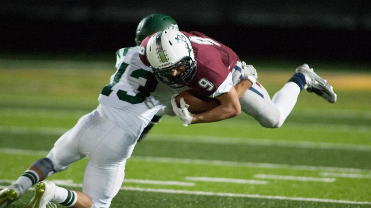 
Chance Montgomery (left) of De Soto upends St. James Academy’s Mason Dunsmore during their game on Friday night. St. James Academy won 26-10.
