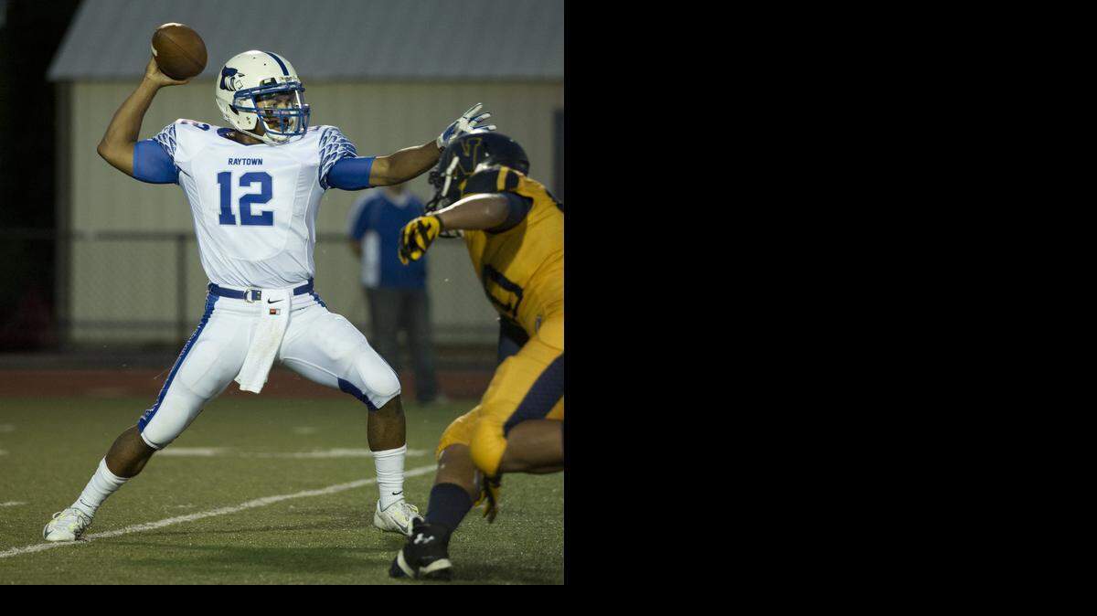 
Liberty North High School played Raytown on Friday evening, Aug. 22, 2014, at William Jewell College in Liberty. Raytown quarterback Joe Straws threw in the first half.

