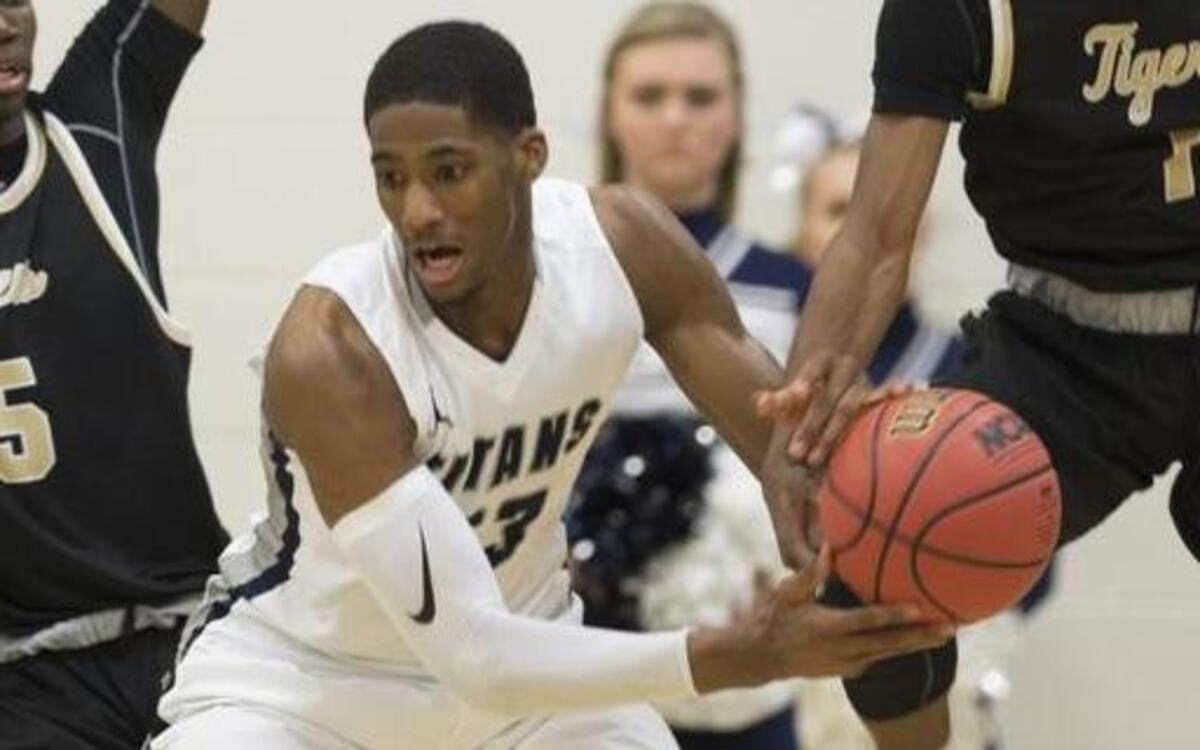 Lee’s Summit West’s Elijah Childs was surrounded by Lee’s Summit defenders during a game last season.
