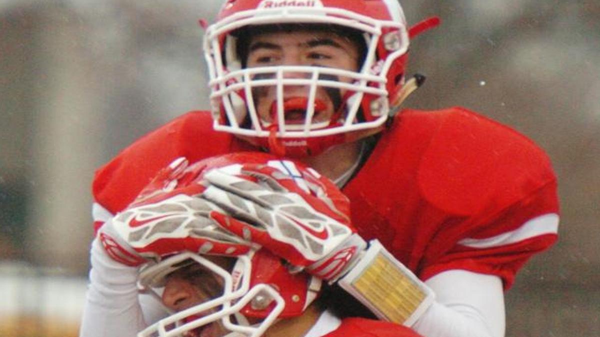 Bishop Miege’s Landry Weber (above) and Ray Vaca celebrated in the end zone after Vaca scored a touchdown on a fumble recovery against Andover Central in Saturday’s game.