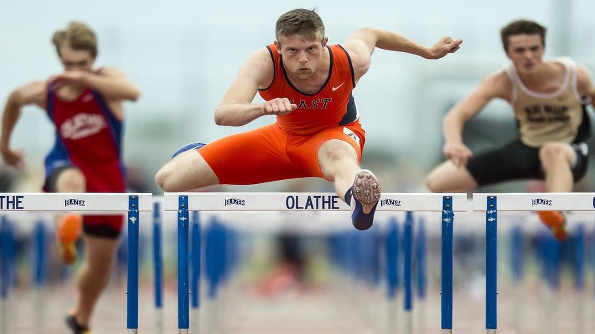 
Olathe East’s Austin Stephens (center) won his 6A boys 110 meter hurdles regional in a time of 14.35 seconds earlier this month.
