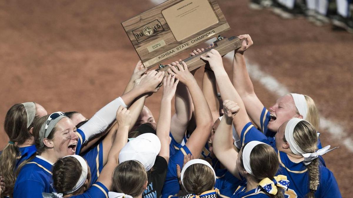 
Members of the Olathe South High School softball team celebrate their 7-3 victory over Olathe Northwest last week in the Kansas Class 6A softball state tournament championship game at Rock Chalk Park in Lawrence.
