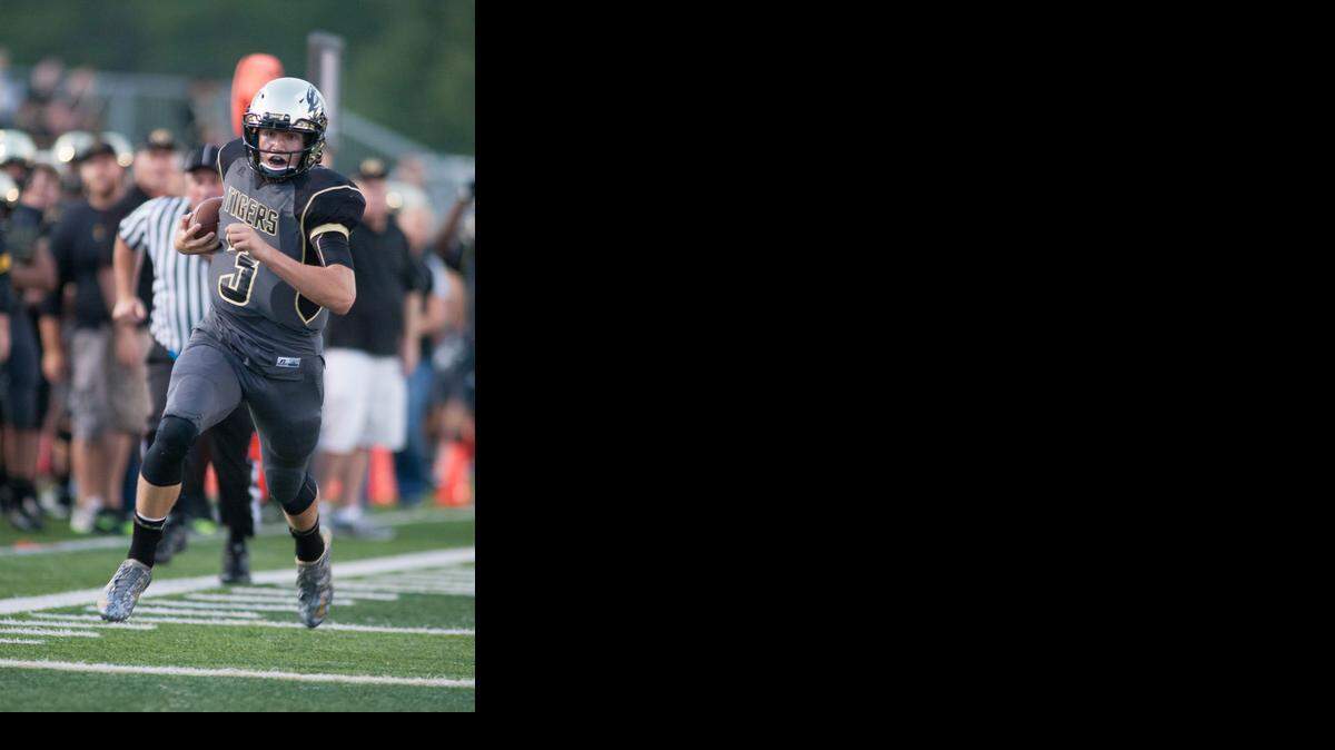 
Lee’s Summit quarterback Drew Lock completed 19 of 26 passes for 309 yards and two touchdowns and ran for two more touchdowns in the Tigers’ 44-38 win over Lee’s Summit.
