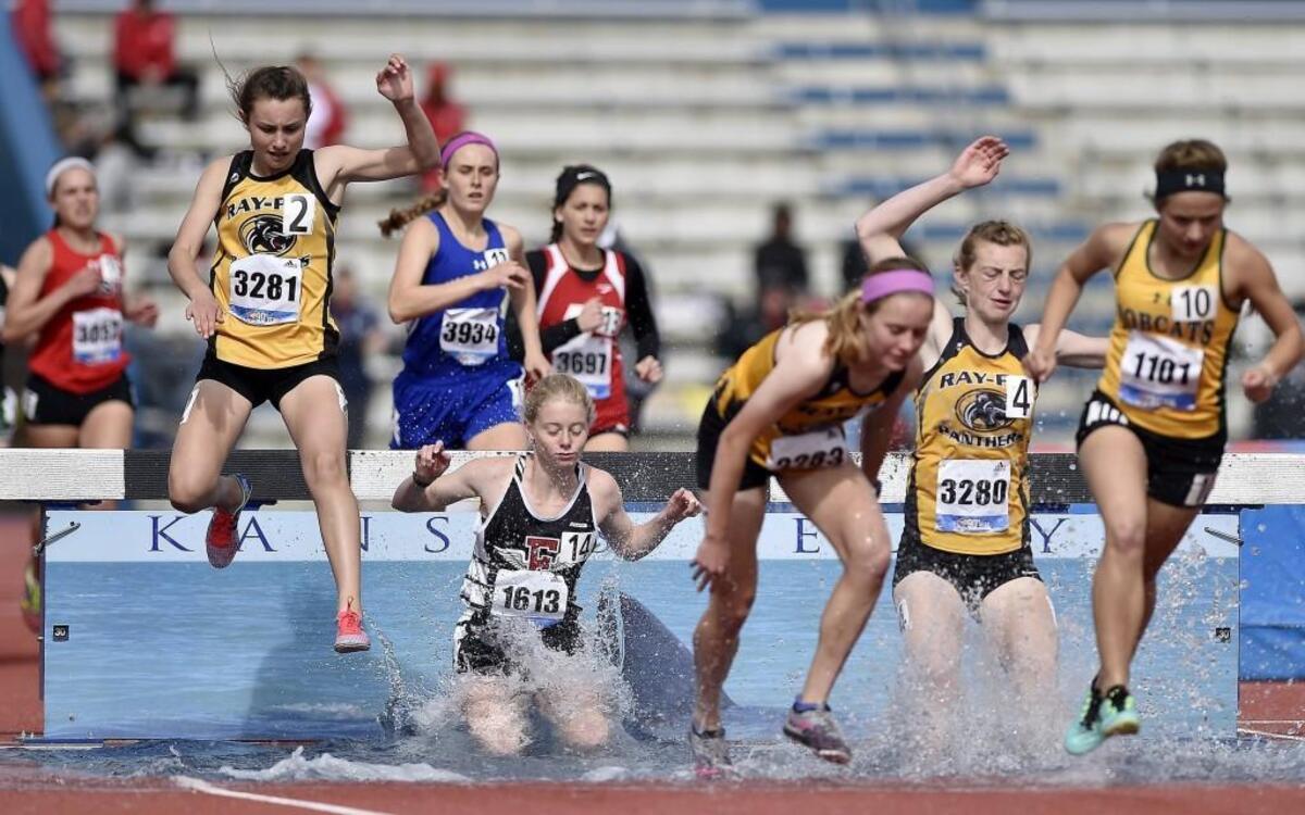 The finals of the 90th annual Kansas Relays at Rock Chalk Park in Lawrence were held Saturday, Apr. 22, 2017. Sophomore Miranda Dick (2) and her sister Marissa Dick (4) of Raymore-Peculiar took first and second place, respectively, in the girls 2,000-meter steeplechase.