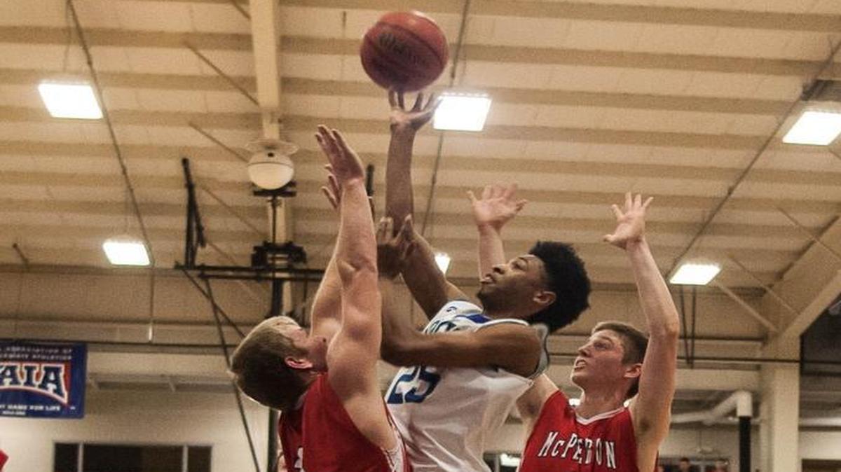 Blue Springs South’s Mike Jones shot a layup against McPherson on Friday night at the Hy-Vee Shootout.