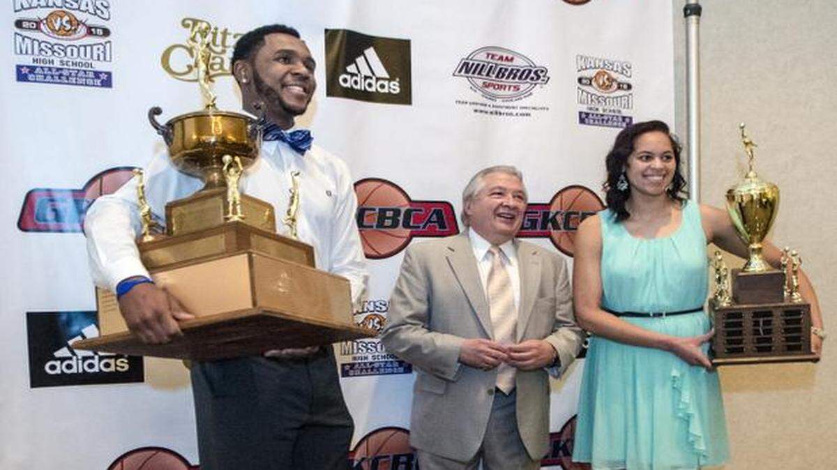 
Kevin Puryear (left), of Blue Springs South High School, and Tyler Johnson (right), of Leavenworth High School, were winners of the DiRenna Award as the top high school basketball players in the Kansas City area on April 9 during a ceremony at the Ritz Charles in Overland Park. Between the winners is Dr. James DiRenna Jr., the son of man who established the award. The winners are chosen by the Greater Kansas City Basketball Coaches Association, which announced the awards during the association’s All-Star Challenge Awards Show.
