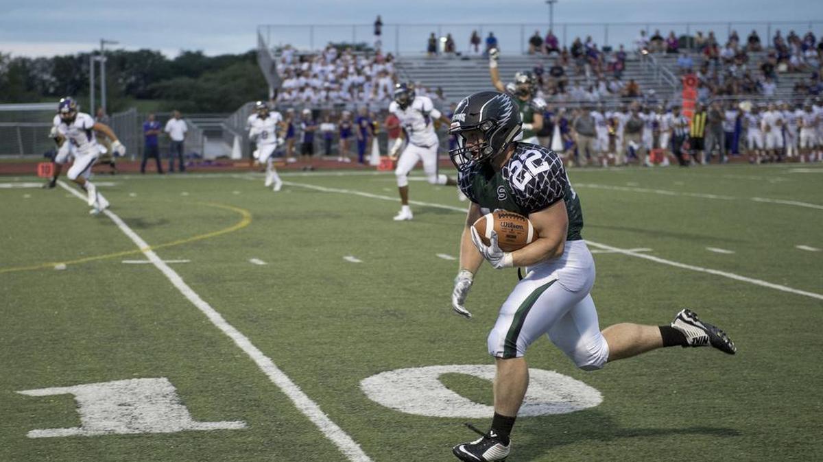 
Staley running back Joe Eller sprinted for at the end zone after hauling in a pass during the Falcons’ game against Blue Springs on Friday night.
