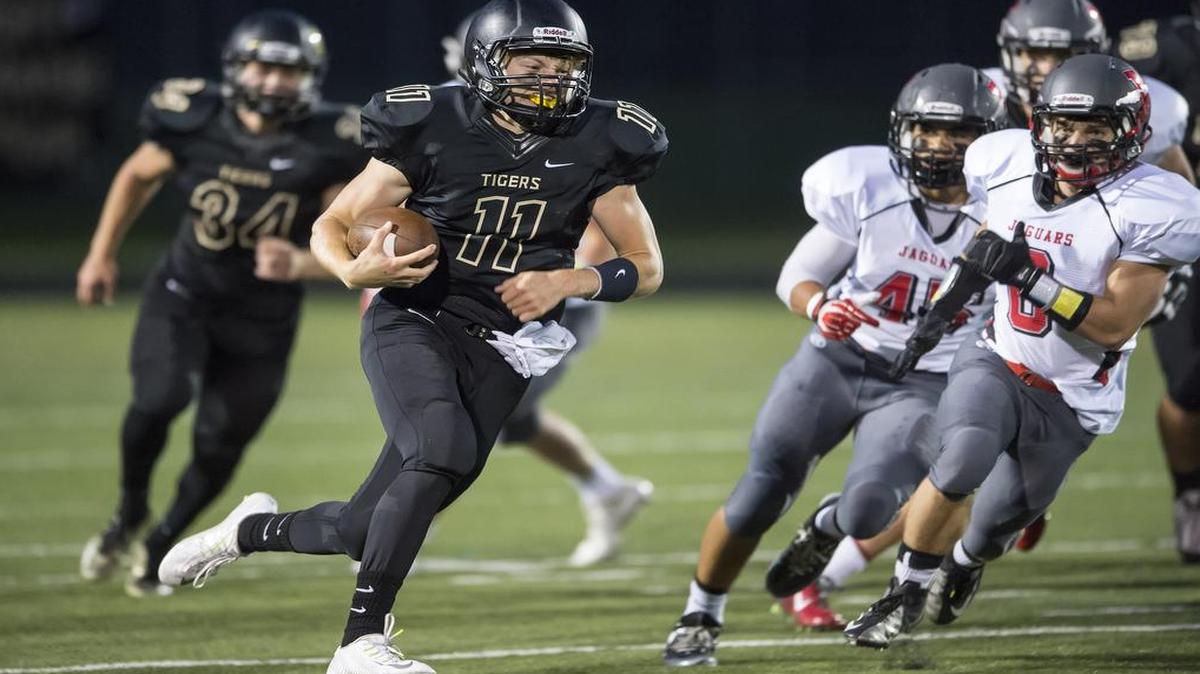 Blue Valley quarterback Colton McCumber has rushed for 981 yards and passed for 1,437 yards this season for the Tigers.