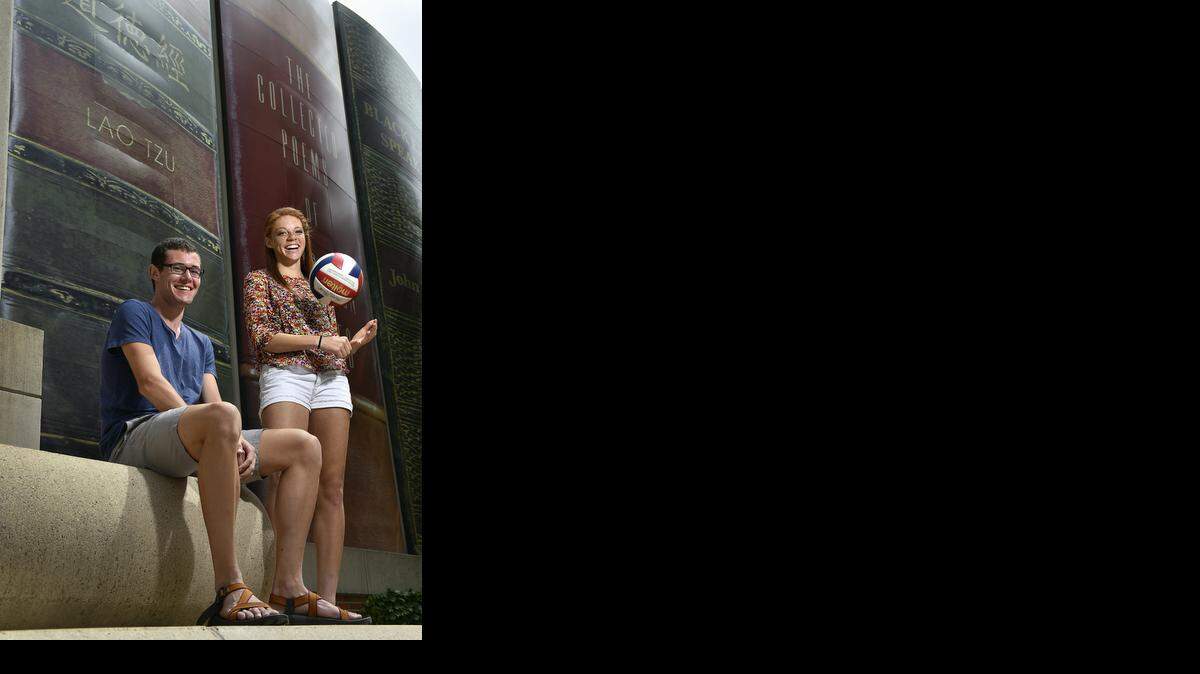 
The giant book bindings of the Kansas City Public Library parking structure provided a backdrop for Blue Valley Northwest’s Sam Guinn and St. James Academy’s Arianna Person, The Star’s Scholar-Athlete overall winners for the 2013-14 school year. 
