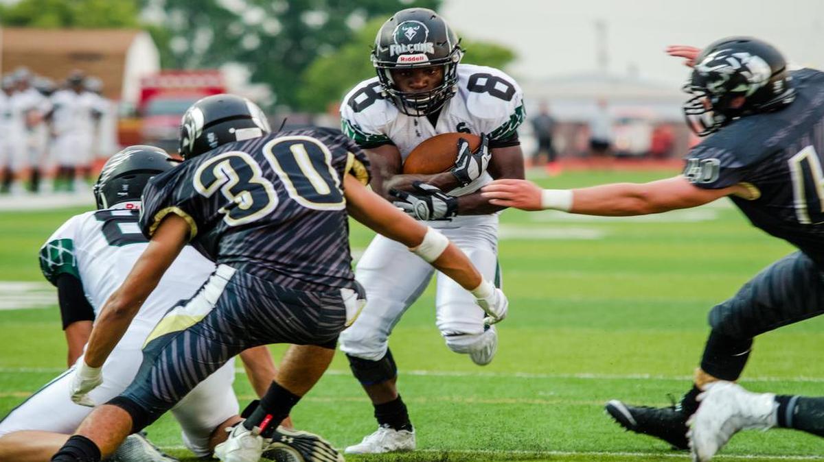 
Staley running back Faizol Bouchard ran for a touchdown in the second quarter against Raymore-Peculiar on Friday night. Staley won the game, 35-10. 

