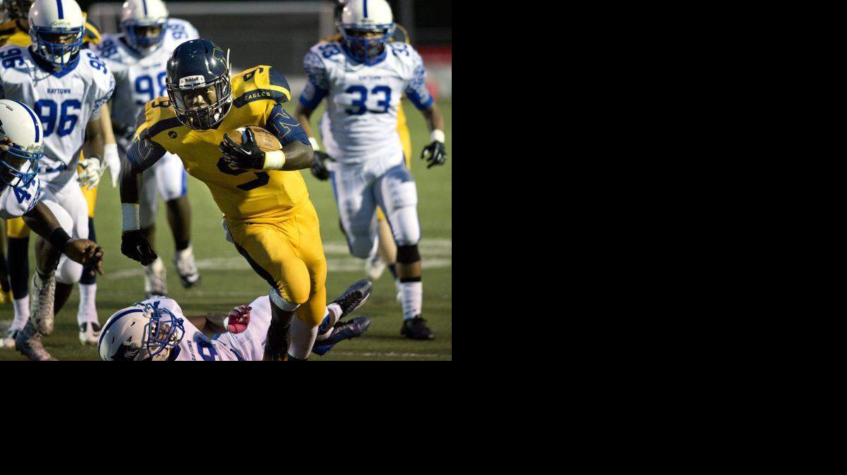 
Liberty North’s Richard Richardson (with ball) and his teammates have a big district game on Friday night at Staley.
