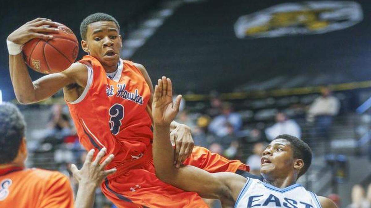 
Olathe East’s Javion Blake (3) picked up 10 points in the third quarter Saturday to help his team to victory for third place in the Kansas 6A state tournament in Wichita. On Friday, he was fouled by Wichita East’s Xavier Kelly in the second quarter.
