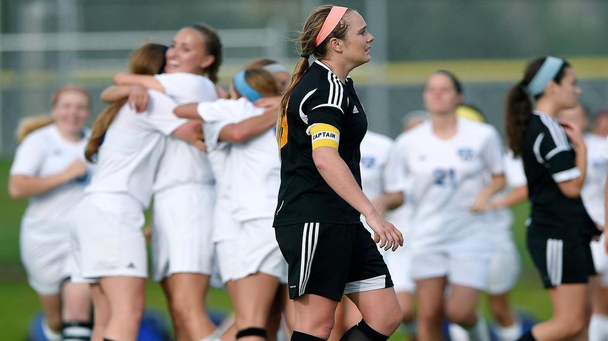 
Shawnee Mission West midfielder Morgan Mauck walked off the field as Washburn Rural celebrated ar 2-1 win during Friday’s Kansas 6A semifinal.
