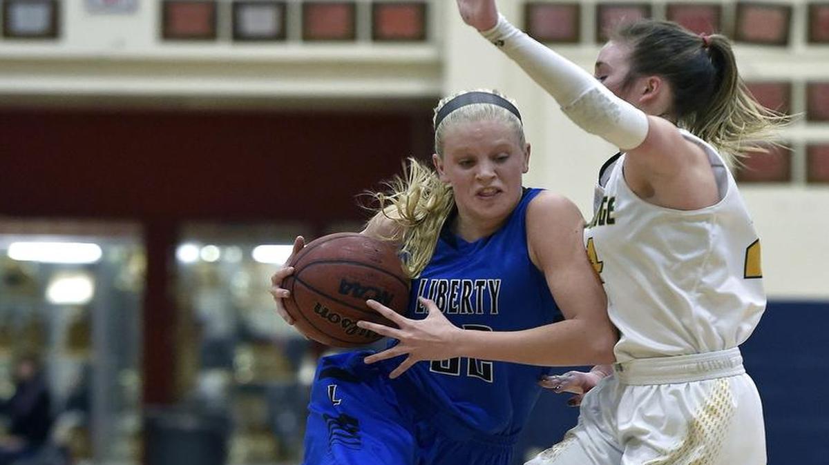 Liberty’s Morgan Fleming looked for a path to the basket against Columbia Rock Bridge in a game this season. She is The Star’s All-Metro girls basketball player of the year.