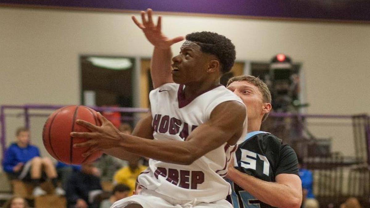 Hogan Prep’s Damien Daniels drove to the basket and scored during a game against Shawnee Mission East during the Hy-Vee Shootout on Saturday at Avila University. Daniels scored 27 points as Hogan Prep won 88-74.