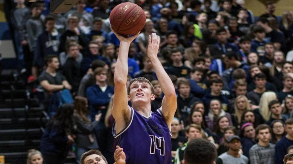 Blue Valley Northwest’s Jackson Heath executed a spin move for a basket against St. Thomas Aquinas on Friday.