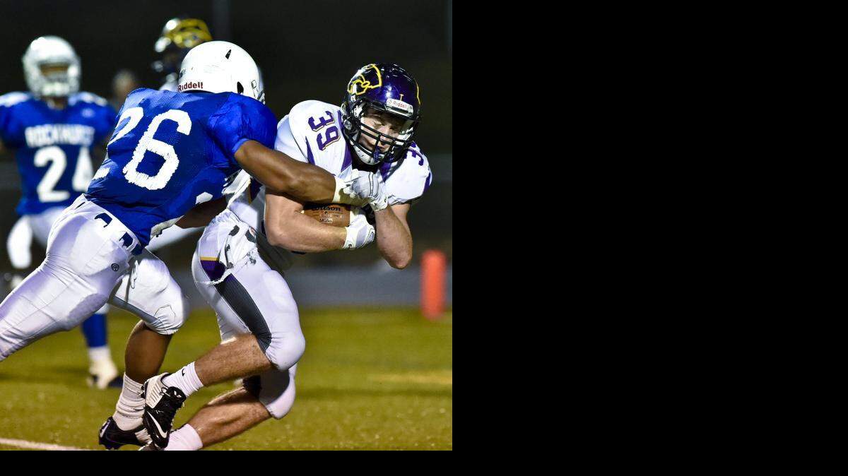 
Blues Springs High School football player Cobi Bissell (right) is tackled in the end zone by Rockhurst’s Joe Giwa during their game on Friday night at Rockhurst.
