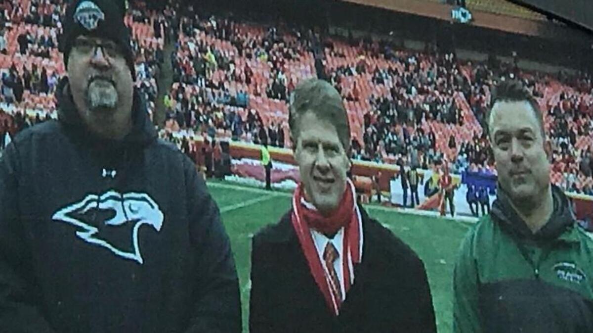 Staley coach Phil Lite, left, Chiefs CEO and chairman Clark Hunt, and DeSoto coach Brian King.