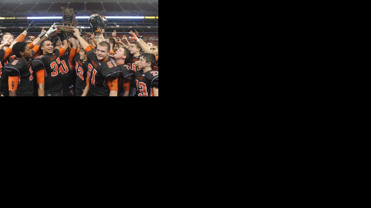 
The Oak Grove Panthers celebrated their 49-27 victory over John Burroughs on Friday in the MSHSAA Class 3 football state championship game at the Edward Jones Dome in St. Louis.

