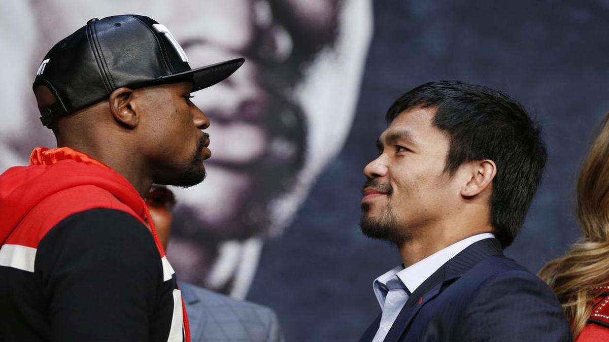
Floyd Mayweather Jr. (left) and Manny Pacquiao got together for a news conference Wednesday one last time before Saturday’s fight in Las Vegas.


