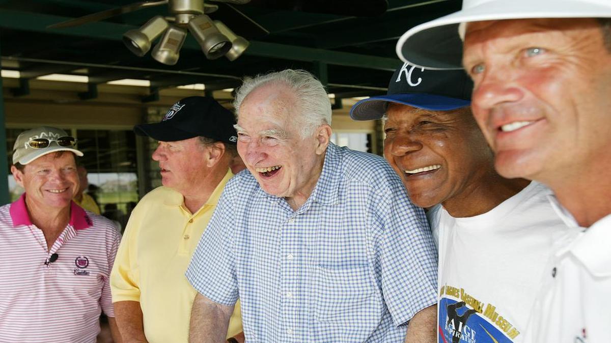 In this KC Star file photo, Kansas City sports writing legend Joe McGuff, center, shares a laugh with, from left, Tom Watson, Len Dawson, Buck O’Neil and George Brett during the second annual Joe McGuff ALS Golf Classic Tournament at the Nicklaus Golf Club at LionsGate in Overland Park, Kansas, in 1999.