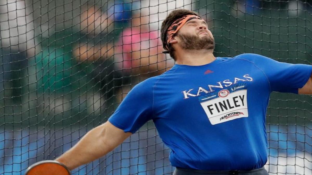 Former KU thrower Mason Finley donned a Jayhawk uniform when he competed during the men’s discus throw final at the U.S. Olympic trials Friday.