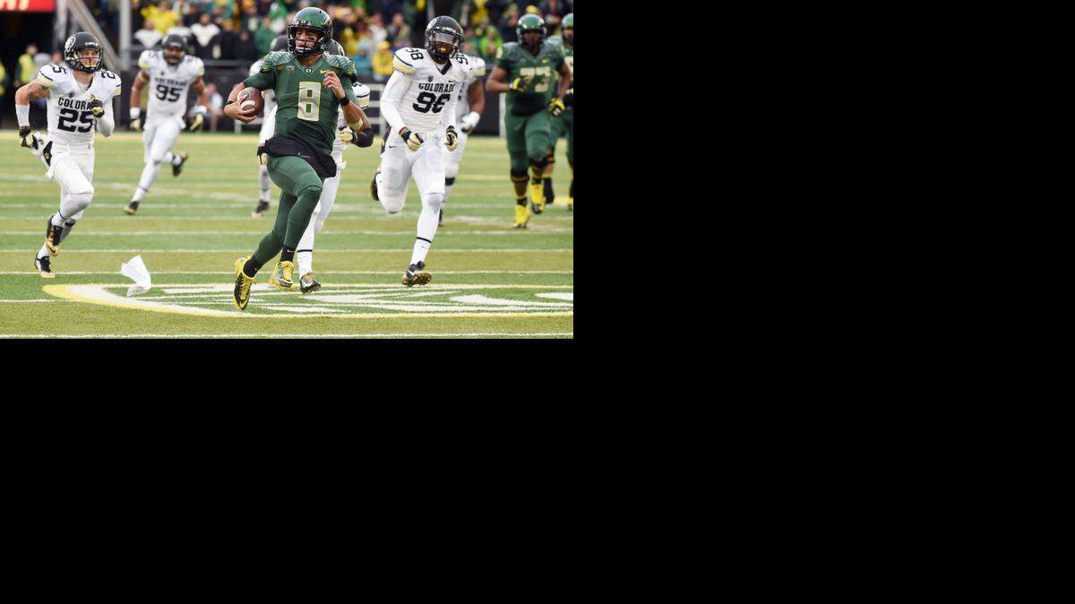 
Oregon, led by Heisman Trophy winner Marcus Mariota (above), and Ohio State will play for the national championship in a rare meeting of two Northern schools.


