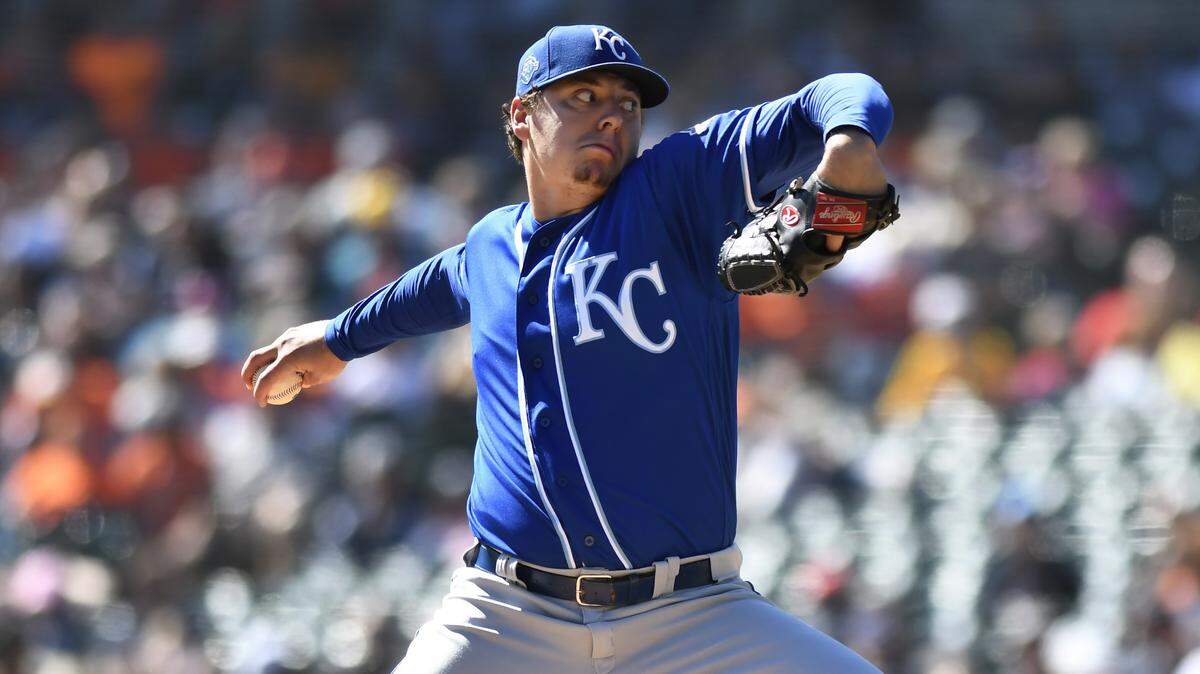 Kansas City Royals starting pitcher Brad Keller throws against the Detroit Tigers during the first inning of a baseball game in Detroit, Sunday, Sept. 23, 2018. (AP Photo/Jose Juarez)
