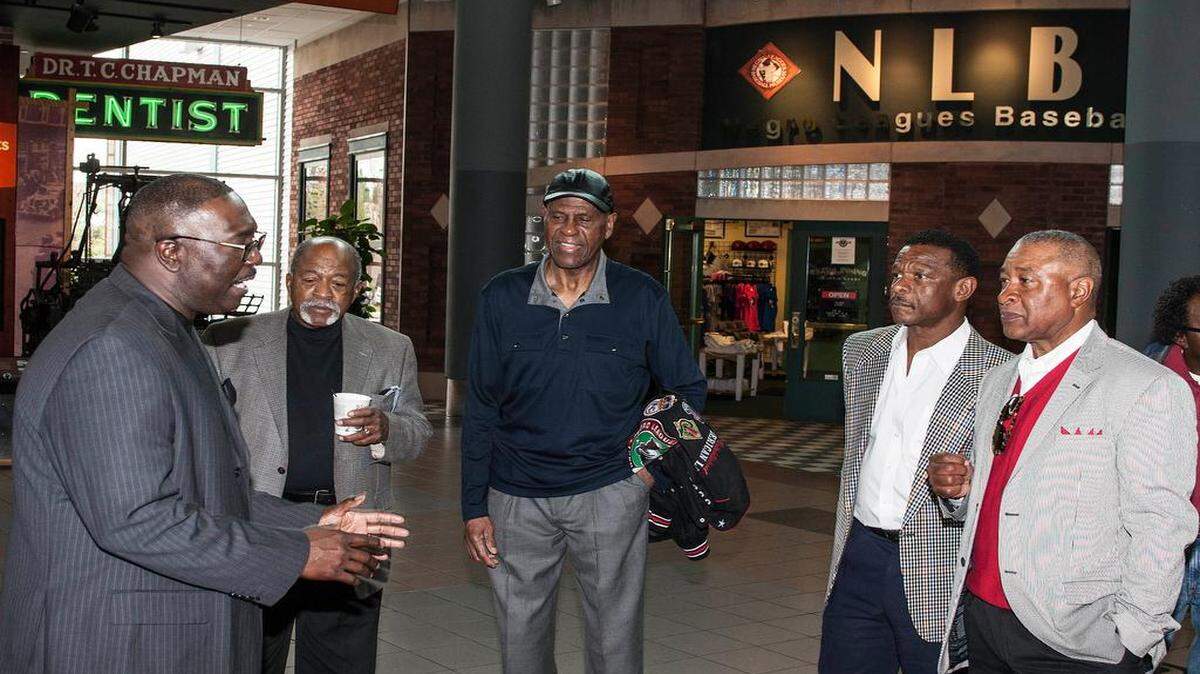 
Director Bob Kendrick addresses inductee Luis Tiant (from left), former Negro League and Major League player George Altman, and inductee's Ricky Henderson and Ozzie Smith before a press conference Saturday at the Negro Leagues Baseball Museum to introduce inductees into the Hall of Game.
