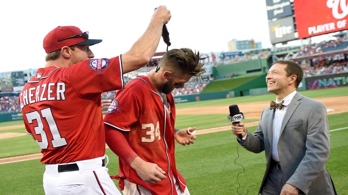
The Washington Nationals’ Bryce Harper had chocolate sauce poured on him by teammate Max Scherzer after Harper hit a two-run walk-off home run in the ninth inning against the Atlanta Braves to end the game on Saturday in Washington. The Nationals won 8-6. 
