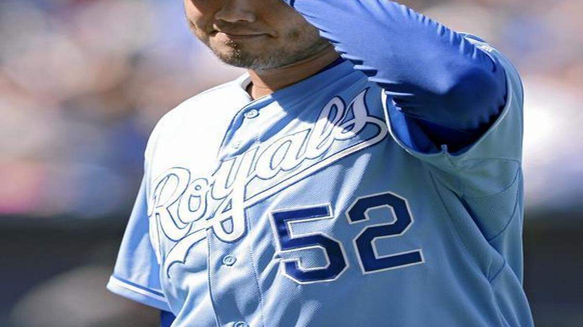 
Kansas City Royals starting pitcher Bruce Chen acknowledged the cheers from the fans as he walked off the field after being relieved in the seventh inning on April 5, 2014, against the Chicago White Sox at Kauffman Stadium.
