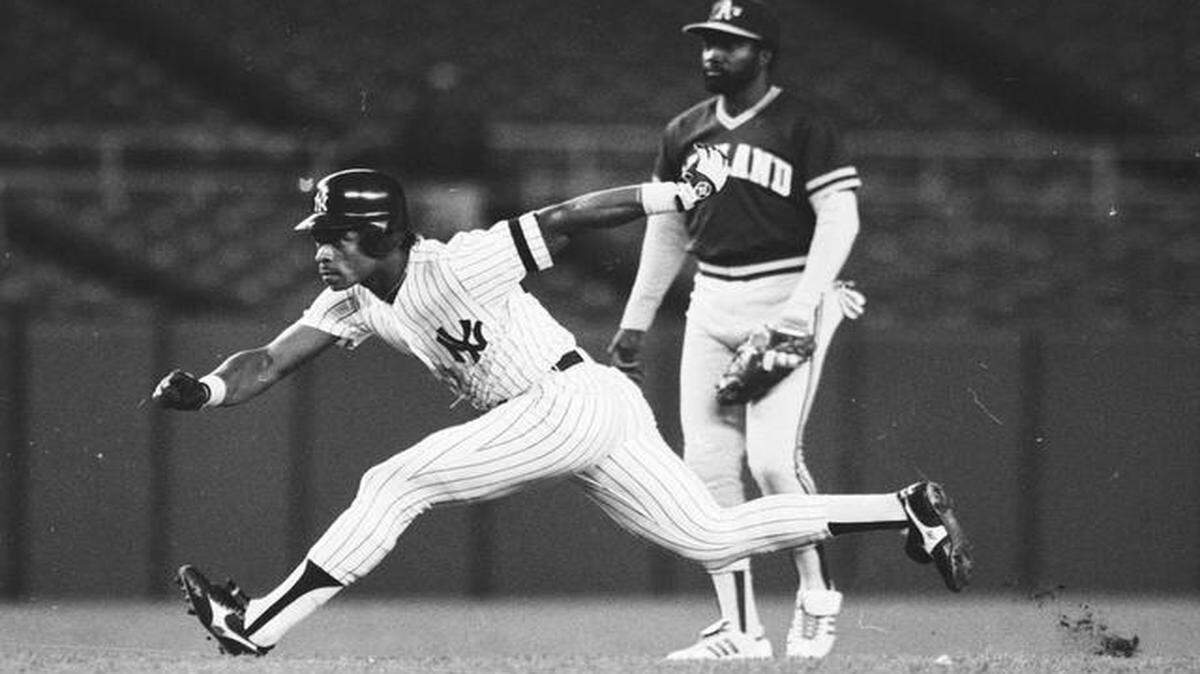 
In this May 22, 1986 file photo, the Yankees’ Rickey Henderson took off on a steal of third base during a game against the Oakland Athletics at Yankee Stadium in New York.
