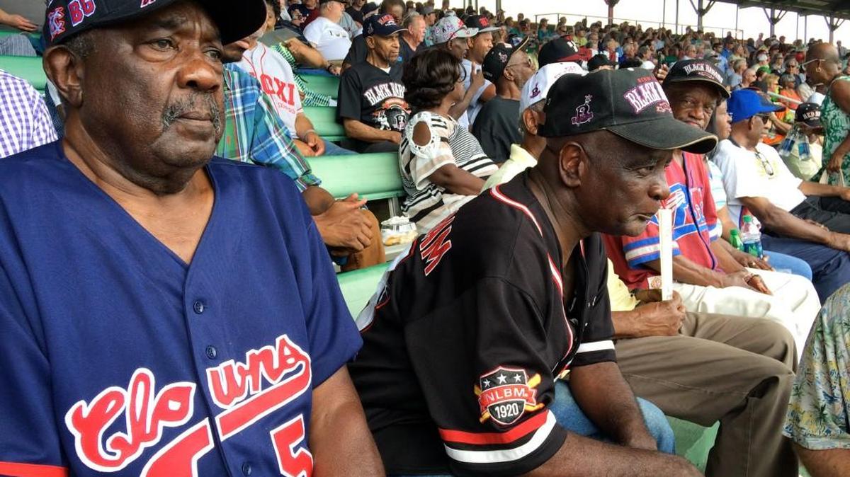 Former Negro League players Jaycee Casselberry, left, and Henry Elmore took in a recent Birmingham Barons game in Birmingham, Ala.
