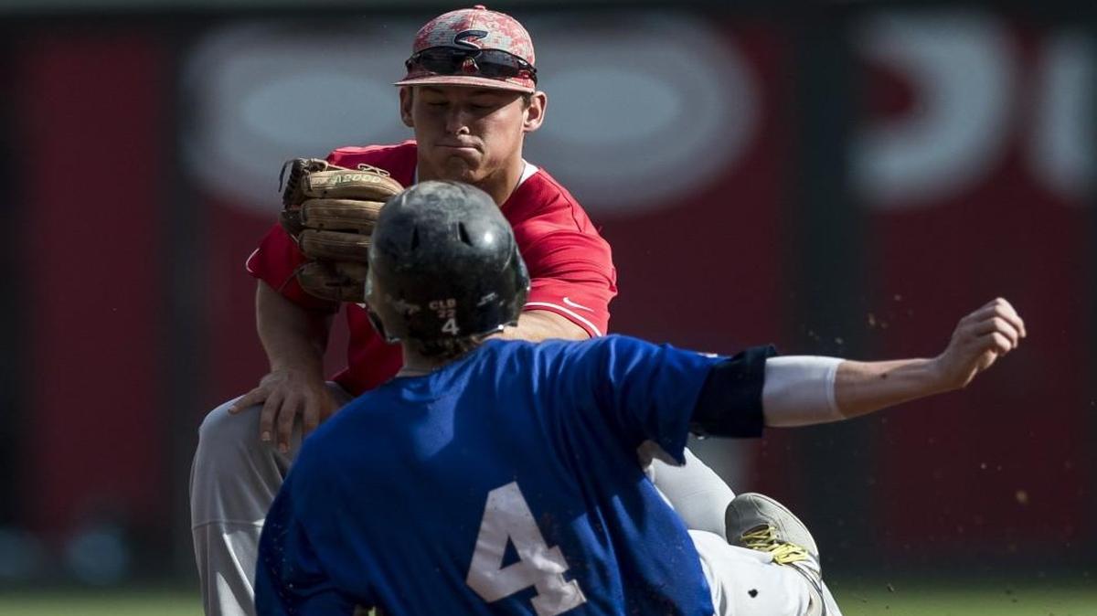 Mitchell Rogers tags out Curtis Boyer during last summer’s Ban Johnson All-Star Game at Kauffman Stadium. This season, games in the showcase league begin on Tuesday, May 30.