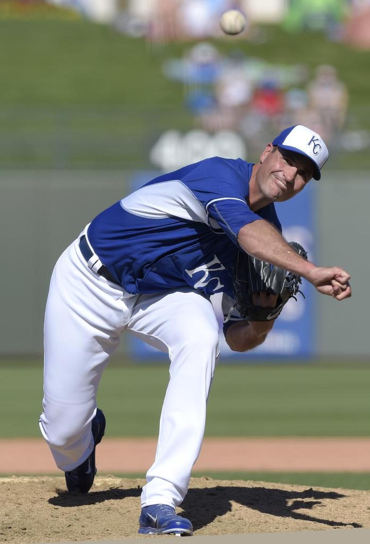 At 6 feet 10, Royals pitcher Chris Young relies upon deception created by his height and the craftiness to discombobulate a hitter’s timing. His fastball has topped out around 87 mph, his highest velocity since 2008. 