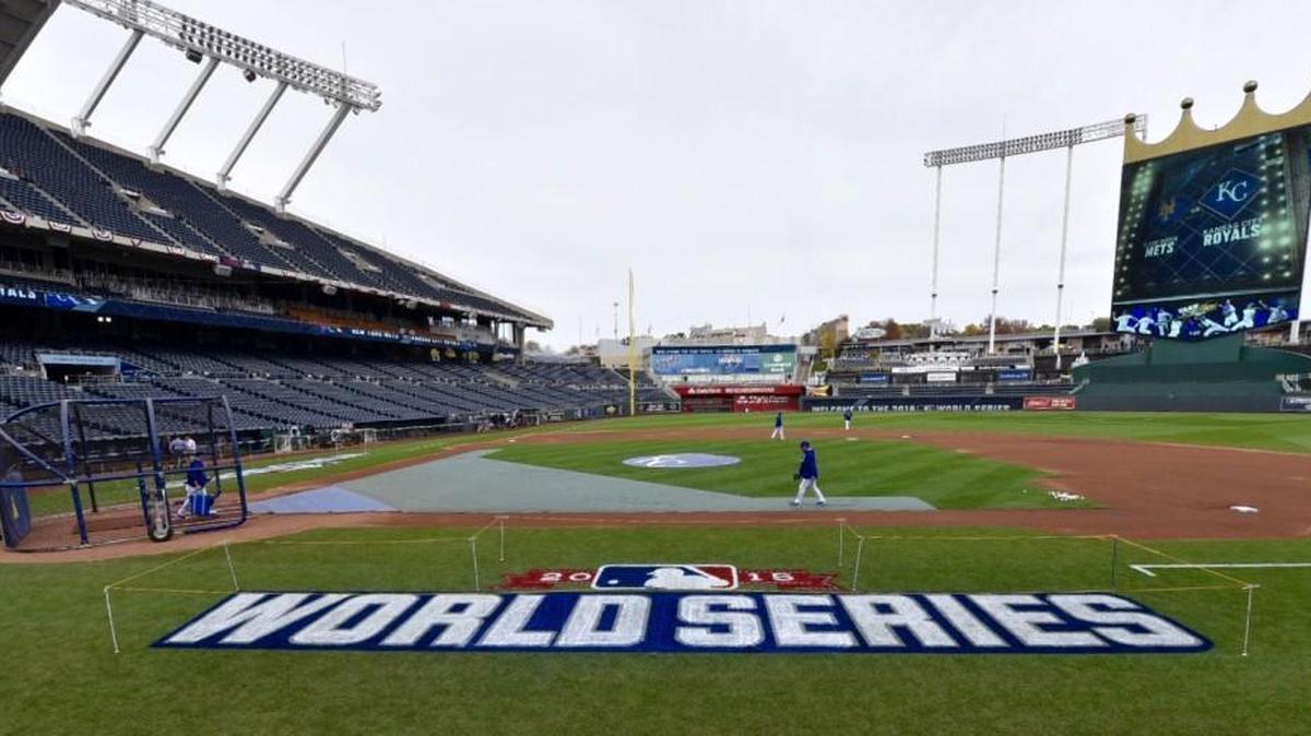 The 2015 World Series logo has been painted onto the field at Kauffman Stadium. World Series tickets are hitting a record high, one seller says.