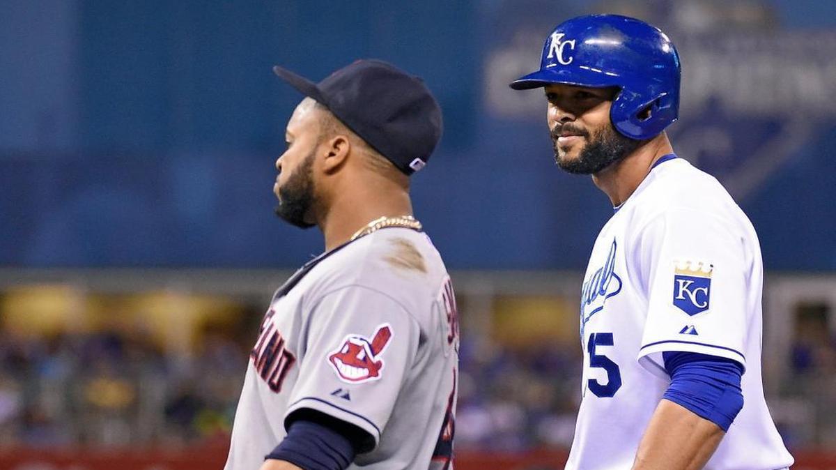 
The Royals' Alex Rios (15) smiles at Indians first baseman Carlos Santana (41) after a single in the seventh inning for the first Kansas City hit against Cleveland starting pitcher Carlos Carrasco during Friday's baseball game at Kauffman Stadium.
