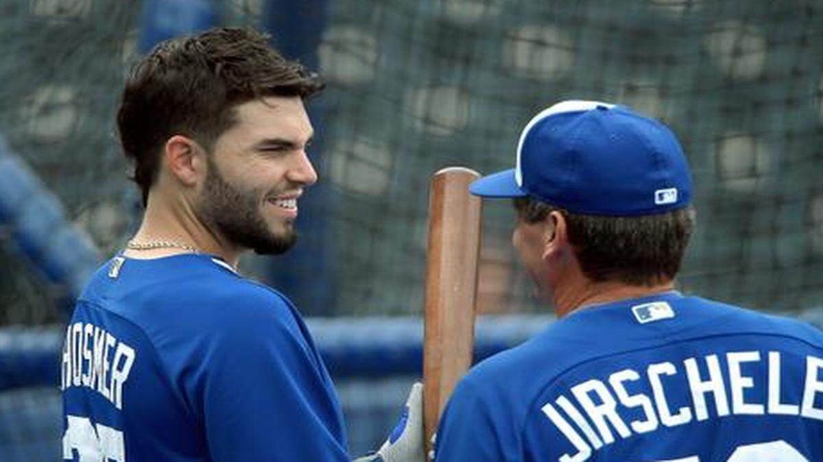 
The Royals' Eric Hosmer (35) visited with third base coach Mike Jirschele at batting practice before Monday's baseball game against the Texas Rangers at Kauffman Stadium.
