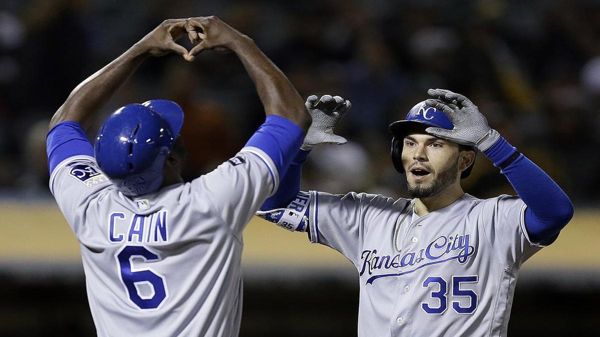 Kansas City Royals outfielder Lorenzo Cain showed some “love” for teammate Eric Hosmer (right) after he hit a two-run home run off Oakland’s Blake Treinen on Tuesday, Aug. 15, 2017.