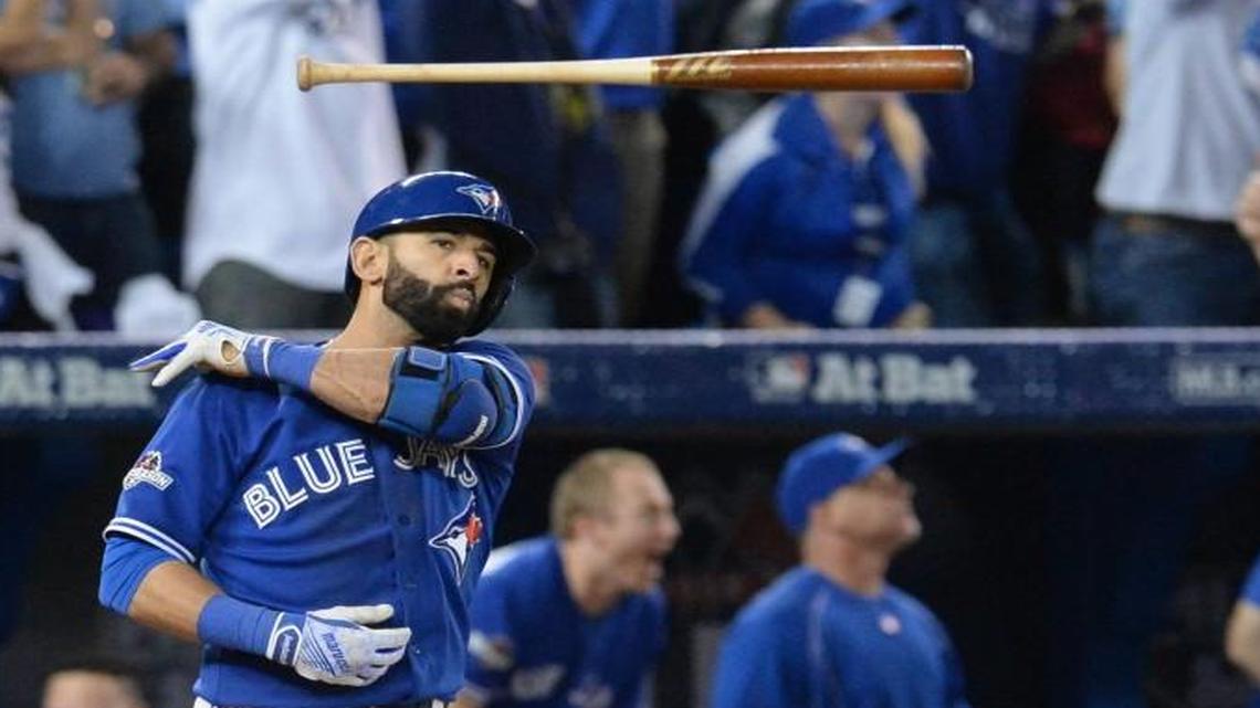 
Blue Jays right fielder Jose Bautista tossed his bat after hitting a three-run home run during the seventh inning in Game 5 of the American League Division Series between Texas and Toronto on Wednesday.
