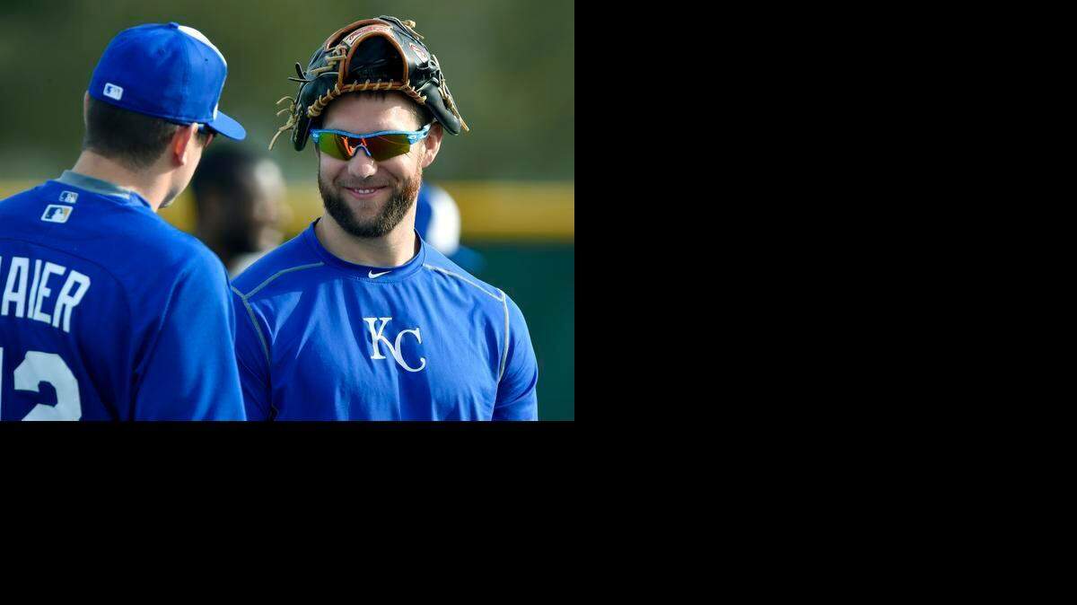 
Kansas City Royals Alex Gordon talks with Mitch Maier during Saturday's spring training workout for the Royals on February 21, 2015 in Surprise, Ariz.
