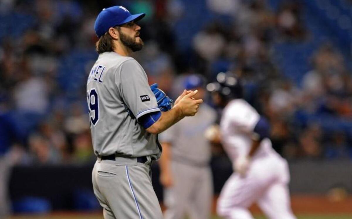 Royals starter Jason Hammel rubbed up a new baseball after giving up a solo home run to the Rays’ Rickie Weeks Jr. in the third inning Wednesday in St. Petersburg, Fla.