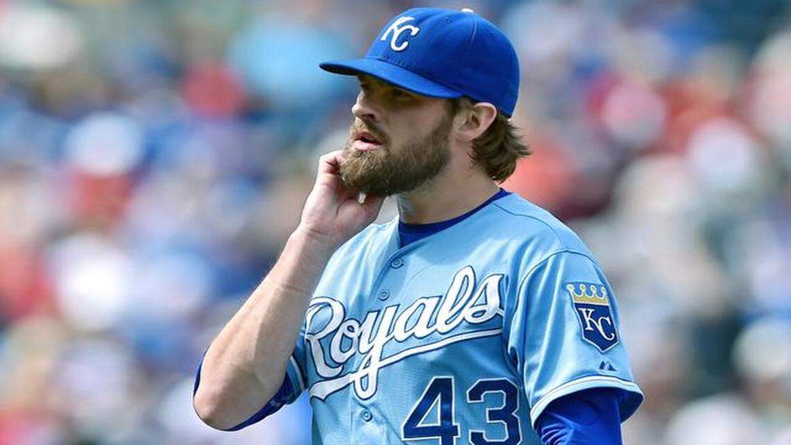 
Royals reliever Aaron Crow (43) walked off the field at the end of the sixth inning after giving up a grand-slam home run to Boston’s Daniel Nava on Sunday at Kauffman Stadium.
